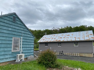 view of the end of the mill building and the side of the wash building
